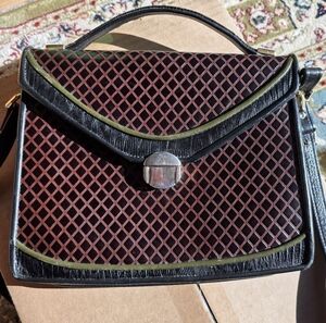 Red-brown with green & black accents leather handbag